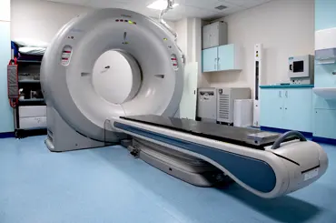 Photograph of a CT scanner.