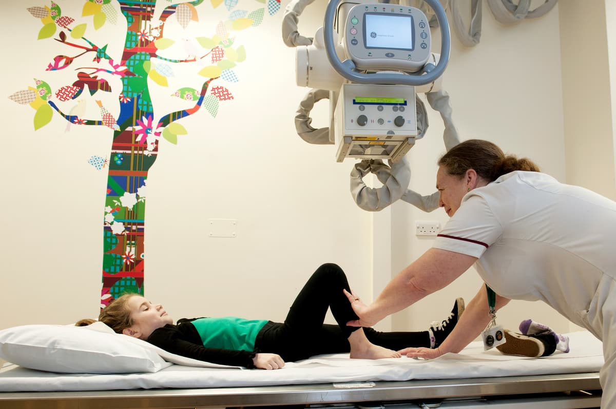 Photograph of a child having an x-ray.