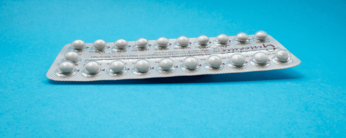 Image of a contraceptive pill packet on a blue background.