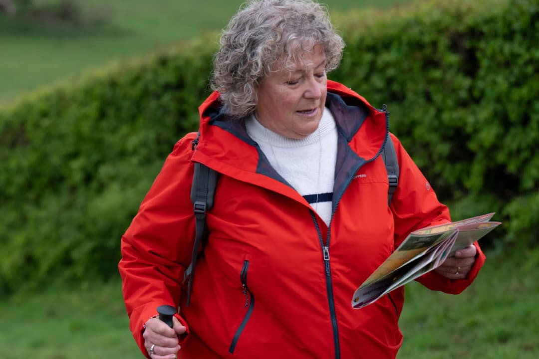 Photo of a woman hiking.