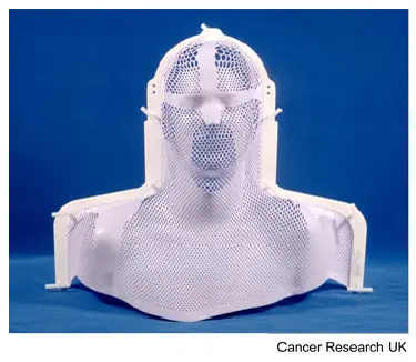 Photograph of a mesh plastic mask used for radiotherapy for cancer of the head and neck and brain.