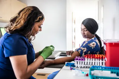 Photograph of a patient having a blood test.