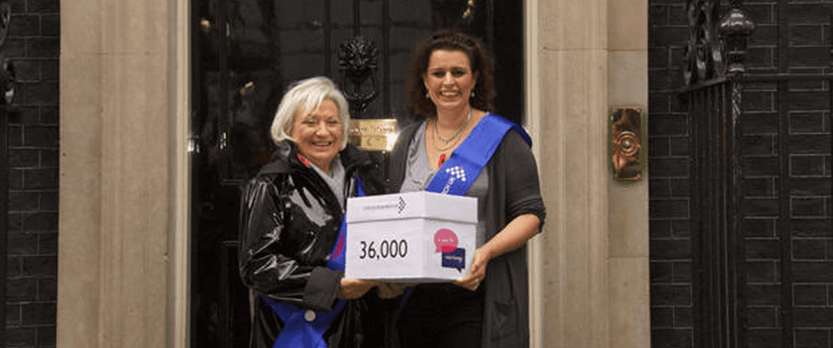 A photo of two Campaigns Ambassadors in front of Number 10.