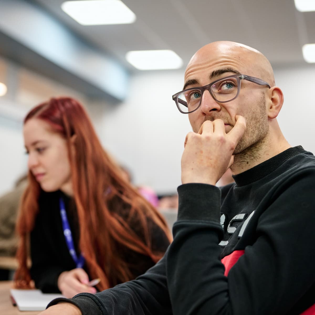 Two people at event.