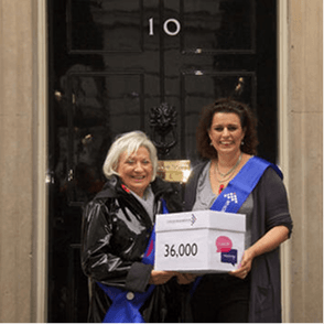 A photo of two Campaigns Ambassadors in front of number 10 Downing Street.