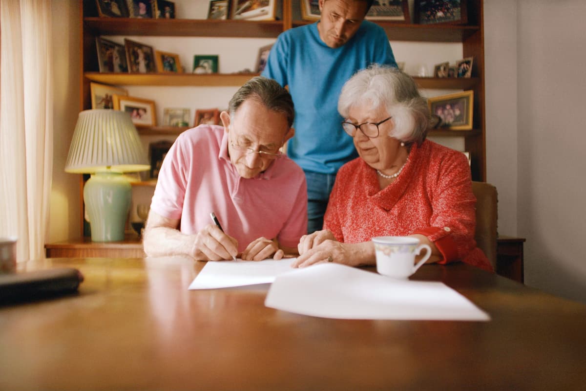 Jo, a legacy pledger, writing his Will.