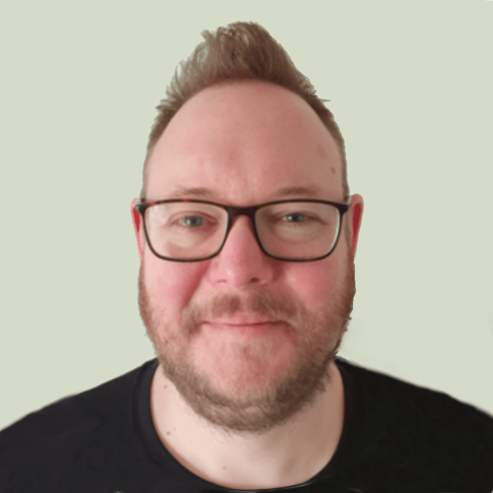 Headshot of Andrew Blake.