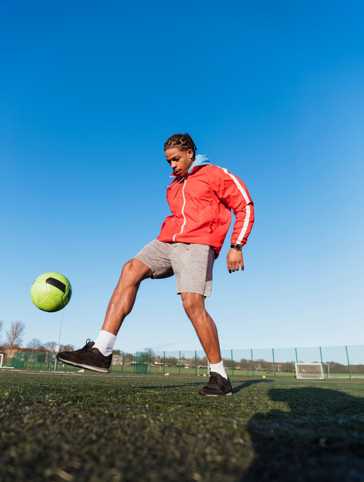 Person doing keepy uppies.