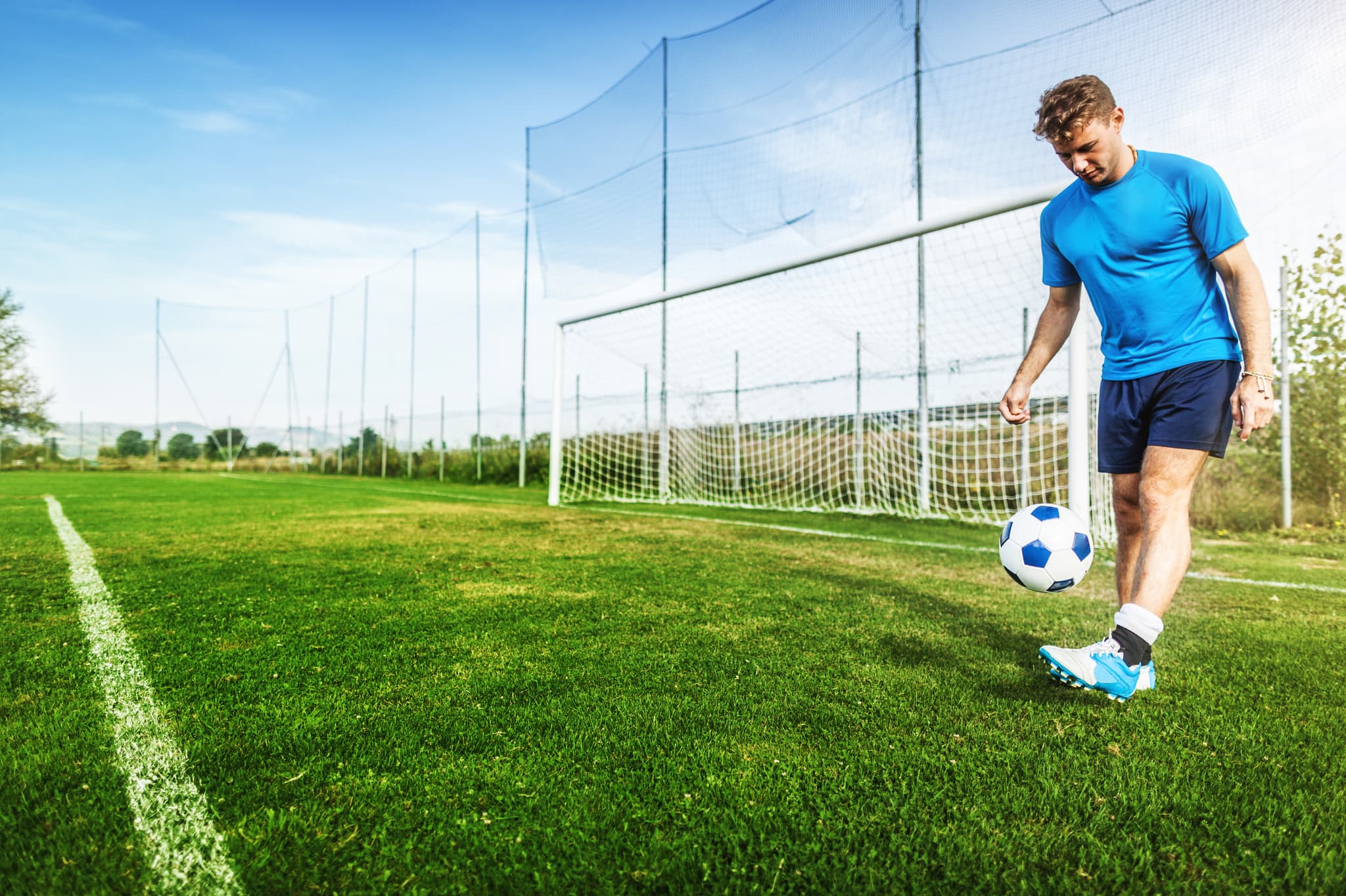 Person doing keepy-uppies.