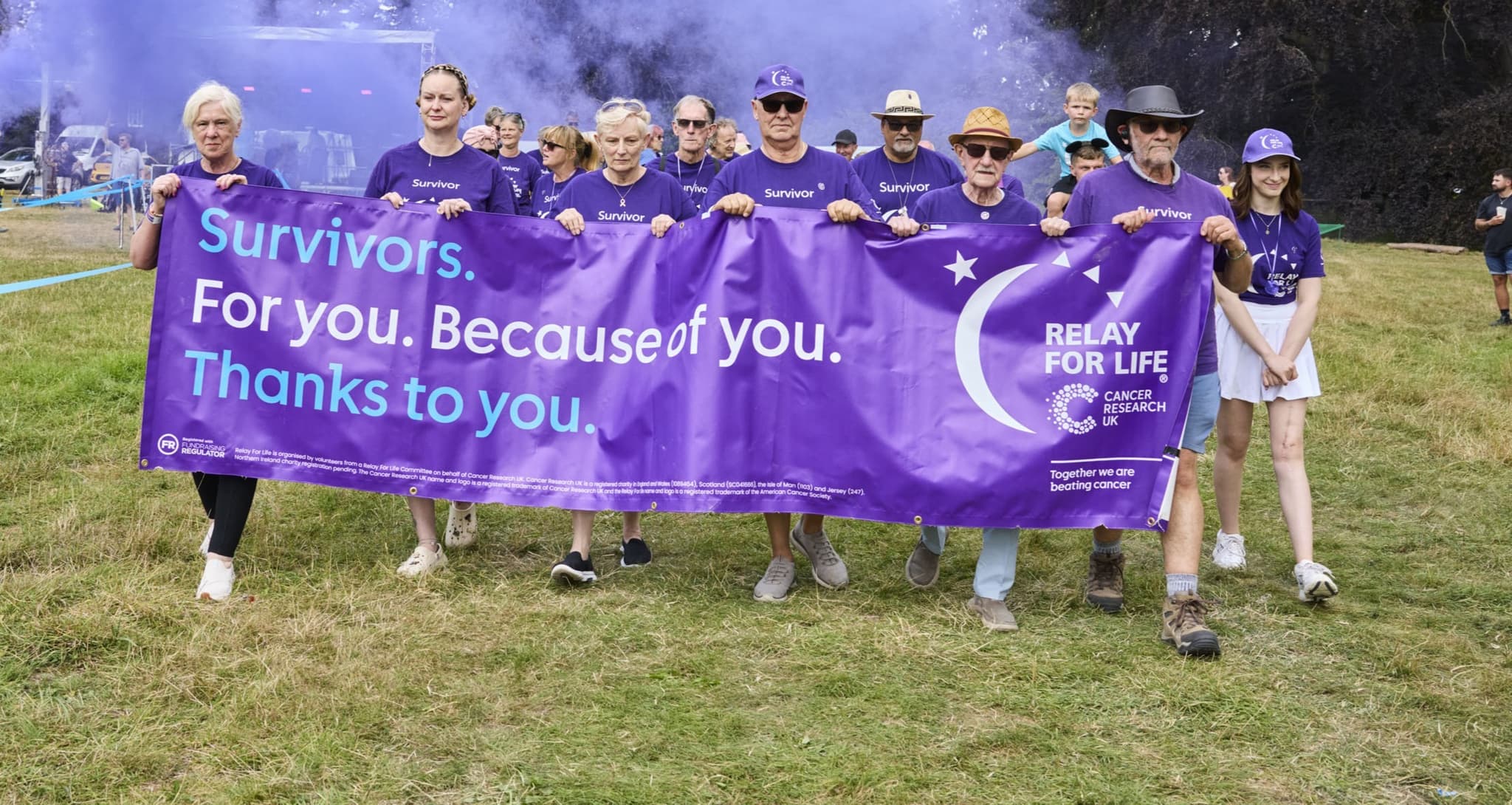 Relay participants completing the lap of honour.