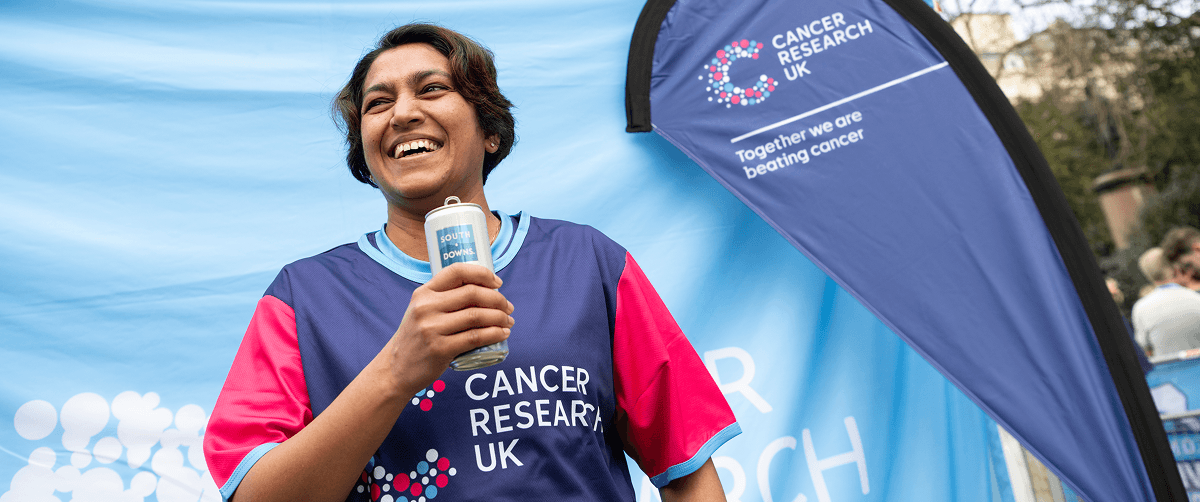 A photo of a Cancer Research UK volunteer smiling.