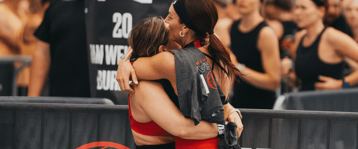 Picture of two women hugging at a DEKA event.