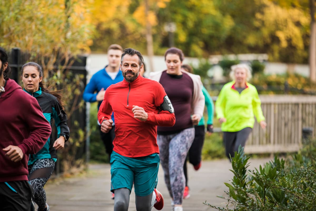 Image of a group of people running.