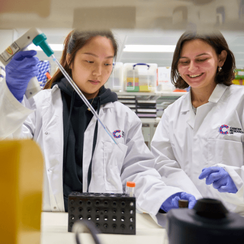 Image of researchers working in a lab together.