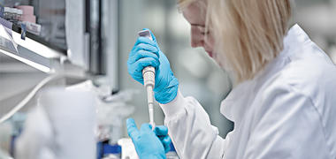 A female scientist working in a lab