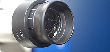 A close up picture of a microscope lens