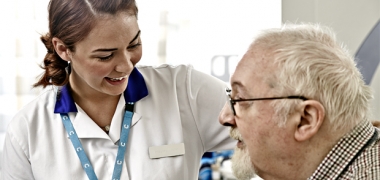 A female nurse with a male patient