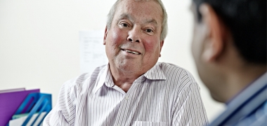 A male patient talking to a doctor