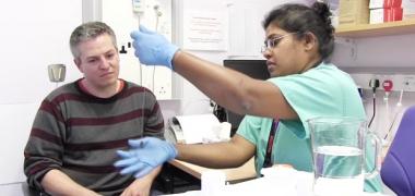 Doctor and patient with sponge on a string test