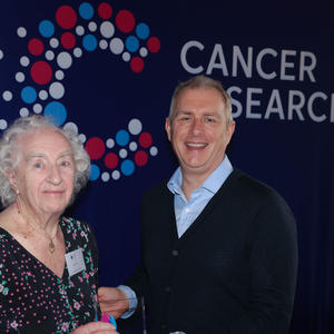 Doreen holding her Flame of Hope trophy