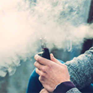Photo of someone using an e-cigarette