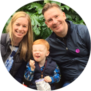 Paul has left a gift in his Will to bring hope to those affected by cancer. Paul is sitting outside with his wife and son. 