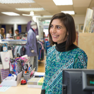 Volunteer in a Cancer Research UK shop