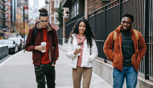 group of three people walking