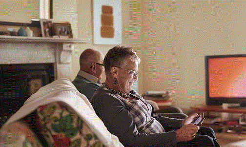 Woman at home using tablet