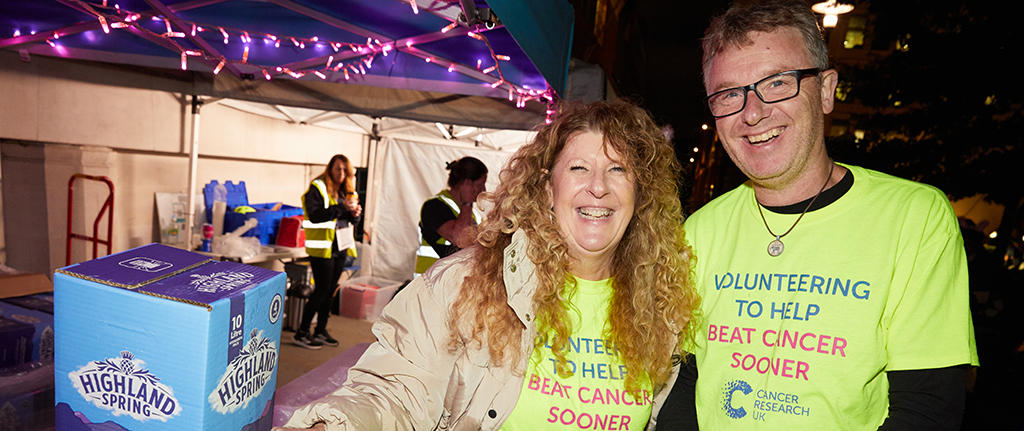 Couple volunteering at Shine Night Walk