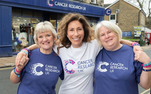 Leeds actress Gaynor Faye outside CRUK Horsforth shop with volunteers Helen and Rachel in 2022. Leeds actress Gaynor Faye standing outside CRUK Horsforth shop with volunteers Helen and Rachel