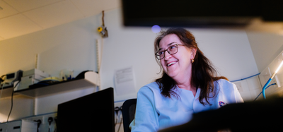 Researcher smiling