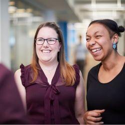 Two women smiling