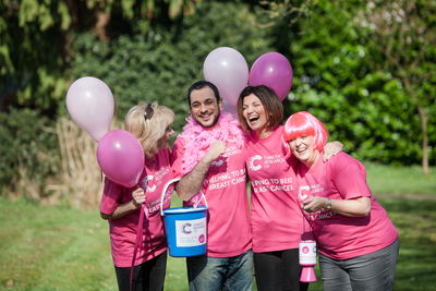 people raising money for breast cancer research