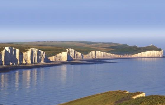 Big Hike event route on the South Coast view of white cliffs that open up to the sea mouth with a view of the horizon.