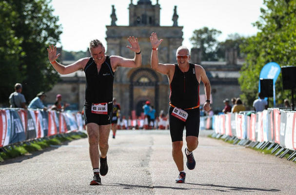 Sign up for the Blenheim triathlon Two men with arms in the air completing the Blenheim triathlon
