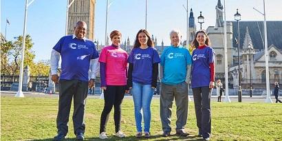 A group of CRUK campaigners stood together in the sun