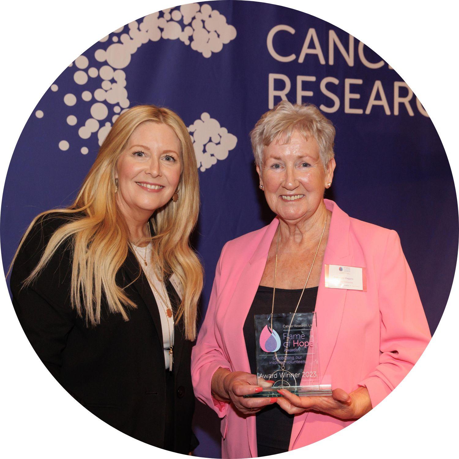Catherine accepting her Flame of Hope Award