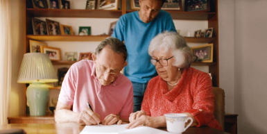 couple signing a will