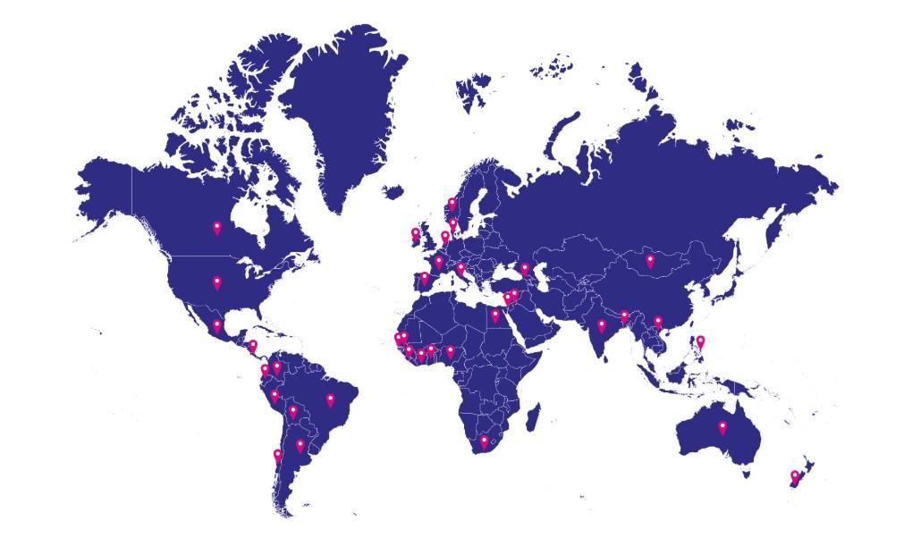 An outline of a world map with location markers showing where Cancer Research UK funds research