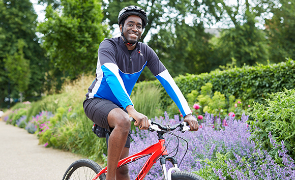 Man cycling in park