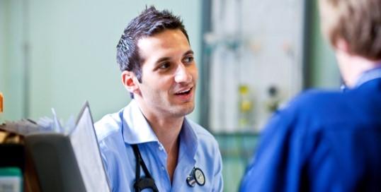 Doctor speaking to a Nurse