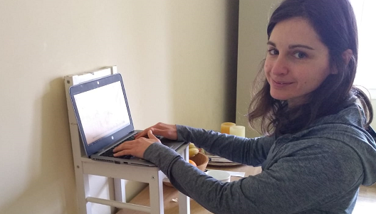 Evropi working on her laptop