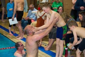 Father and son in pool