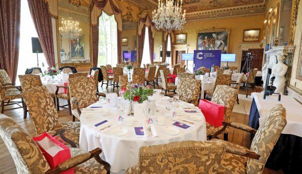 Tables set up in an ornate room for the Flame of Hope Awards Ceremony