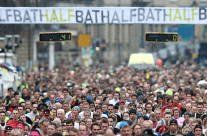 Take on the Bath Half Marathon! A crowd running the Bath Half Marathon
