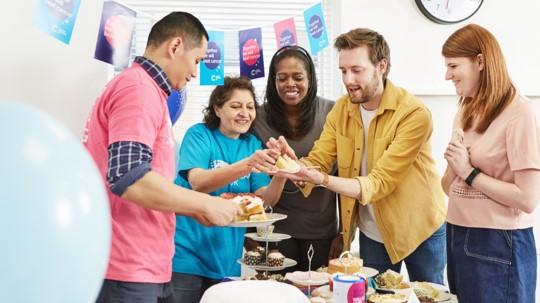 Friends holding a bake sale to fundraise 