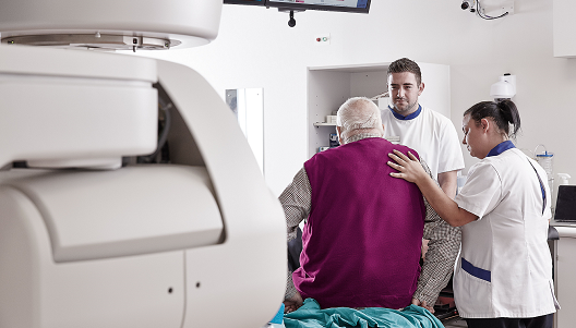 Male patient with nurses