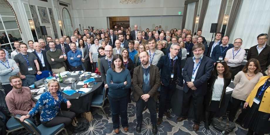 Grand Challenge-funded researchers standing together