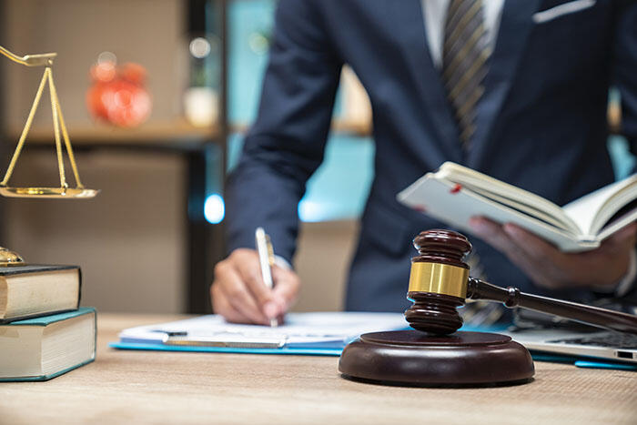 Legal image with justice scale and gavel